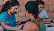 Photo of nurse and two patients